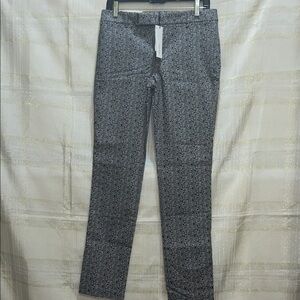 Calvin Klein Women Fitted Black and White Patterned Trousers.